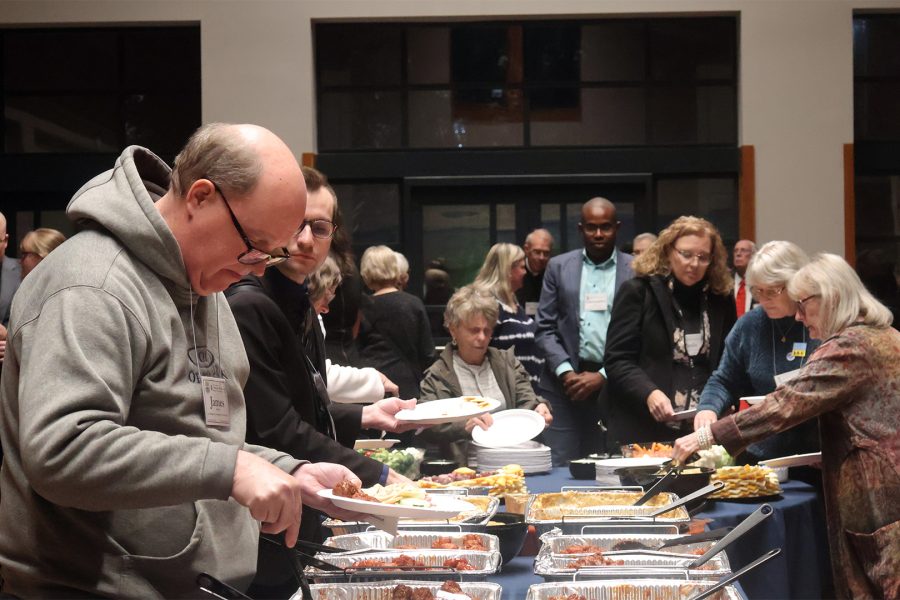 Everyone gathering for food at reception