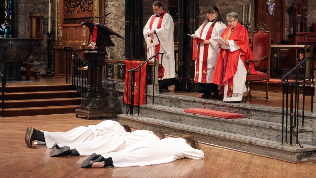 Ordinands Prostrating in Front of the Bishop