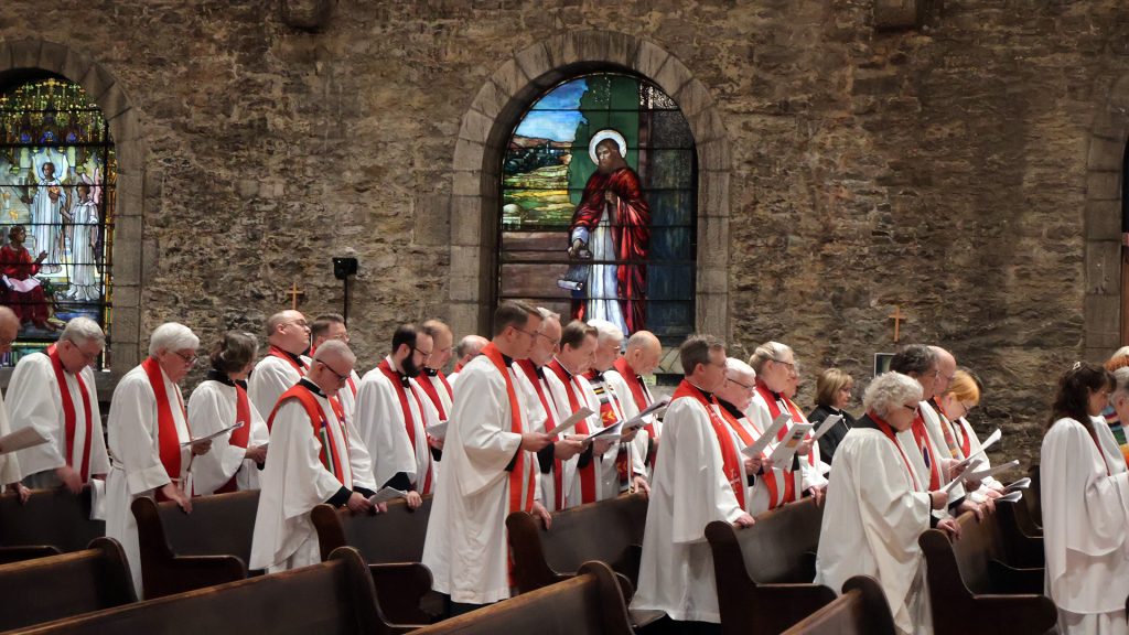 Clergy praying Renewal Service