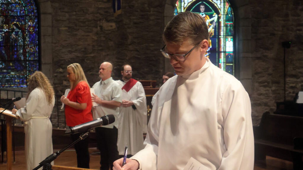 Katherine and Silas Ordination Signing