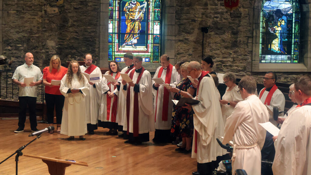 Katherine and Silas Ordination Signing