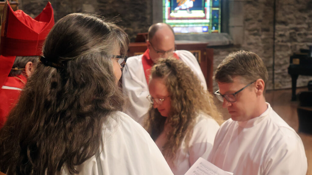 Silas and Katherine Ordination Kneeling