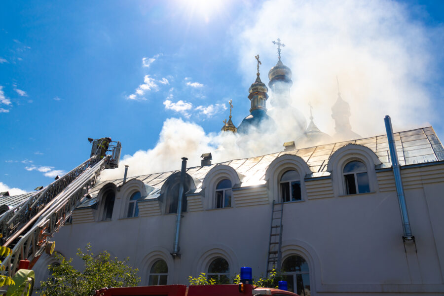 Fire in the church. The church is smoking. Rescuers extinguish the fire