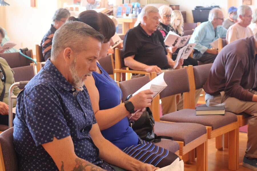 Congregation praying in church